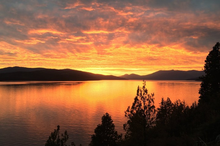 a sunset over a body of water